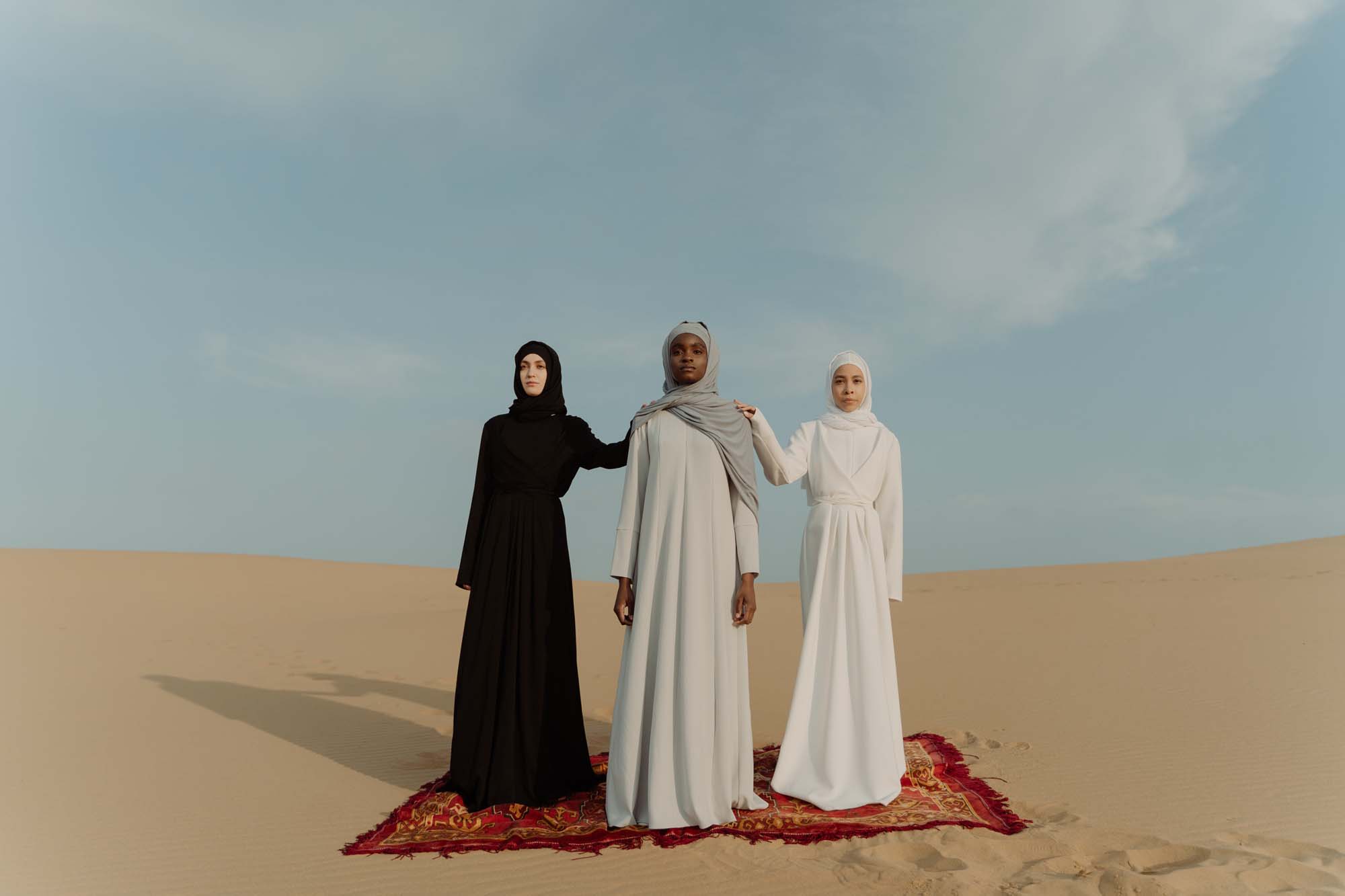 Three women in the desert